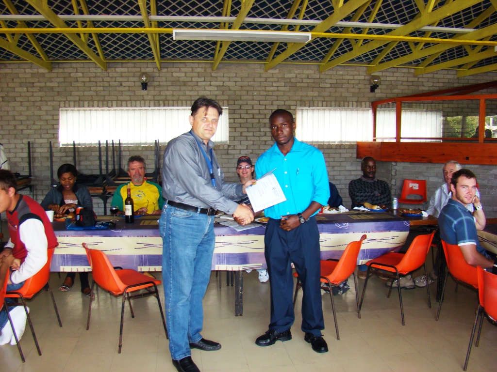 Farai receives his prize from Igor